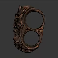 Artistic Copper Jewelry With Intricate Mythical Face Carvings And Elaborate Patterns