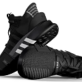 Pair Of Black Sports Shoes With White Stripes And Modern Design