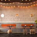 Modern Industrial Restaurant Interior With Orange Booths Green Plants Dining Tables And Warm Lighting