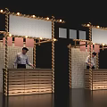 Stylish Tea Break Area With Wooden Counters String Lights Geometric Backdrops White Boards And Staff