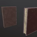 Vintage Leather Bound Books With Ornate Gold Embossed Designs On Covers