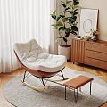 Cozy White Padded Wooden Rocking Chair With Footstool By Window On Grey Rug With Green Plant