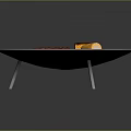 Round Metal Outdoor Grill With Skewered Sausages And Corn On Rack