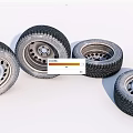 Car Tires With Silver Rims And Deep Tread On White Background