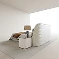 Modern Double Bed With Upholstered Headboard Pillows Bedspread And Bedside Lamps On Plush Rug