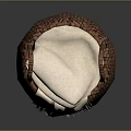 Brown Woven Basket With Two Handles Holding Beige Blanket On Gray Background