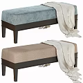 Light Blue and Beige Upholstered Sofa Bench with White Blanket Draped Over Dark Legs