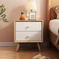 Light Wood Nightstand With White Drawers Table Lamp And Colorful Blocks In Bedroom