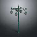 Green Decorative Street Lamp With Ornamental Top And Multiple White Lampshades
