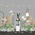 Floral Display With White Flowers Star String Lights Rabbit Figurine And Greenery On Wall Background