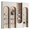 Modern Arched Display Cabinet With Built in Lighting And Decorative Items Books And Sculptures On Shelves