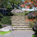 Garden Landscape Featuring Stone Steps Red Leaf Trees Rocks Green Plants And Grass 3d model