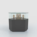 Jewelry Display Case with Glass Top and Wooden Cabinet Featuring Black Mannequins and Decorative Object