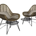 Modern Wicker Leisure Chairs With Black Metal Legs And Light Colored Cushions