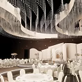 Elegant Banquet Hall Interior With White Arches Crystal Chandeliers And White Tables