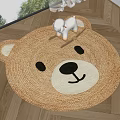 Woven Round Bear Face Brown And White Rug On Wooden Floor With Small Plush Toy