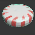 Shiny Round Red And White Striped Peppermint Candy On Black Background
