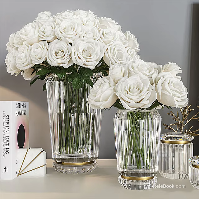 White Roses In Two Crystal Vases Arranged On Table With Decor Items 3d model 
