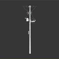 Tall Utility Pole With Mounted Electrical Equipment And Power Transmission Lines