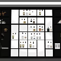 Modern Wine Cabinet With Glass Shelves LED Lighting And Various Liquor Bottles