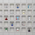 Assorted Stuffed Dolls Displayed on White Cubby Shelves with Various Characters and Designs