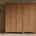 Modern Wooden Three Door Wardrobe In Neutral Room With Green Plant