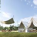 Elegant White Canvas Glamping Tents On Sunny Lawn With Cozy Outdoor Leisure Dining Spaces