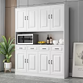 Modern White Sideboard Cabinet With Microwave Storage Drawers Bottles Lemons And Decorative Plants