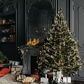 Classic Christmas Living Room With Decorated Fireplace Lit Tree Gifts Sofa And Bookshelf