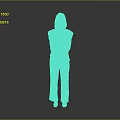 Woman in Light Colored Top and Blue Jeans Standing Against Gray Background