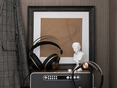 Stylish Over Ear Headphones With Gold Accents On Black Audio Speaker Near White Bust 3d model