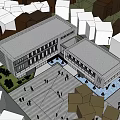Modern Community Building With Glass Walls Surrounded By Lush Trees And Open Square With People