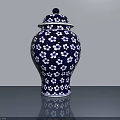 Traditional Blue and White Ceramic Jar with Floral Patterns and Lid