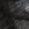 Black Glossy Wet Floor Tiles With Marble Stone Texture Neatly Arranged And Visible Grout Lines