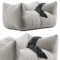 Cozy Modern Light Gray Fabric Two-Seater Sofa With Stitched Details And Dark Fringe Blanket