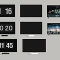 Multiple Wall Mounted TVs with Digital Clocks Black Screens and Movie Content