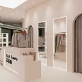 Stylish Clothing Store Window Display With Mannequin And Hanging Clothes On Racks