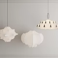 Three Modern Textured Chandeliers Hanging Against Gray Wall Interior Design 3d model