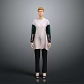 Woman Wearing White Top With Green And Black Spliced Sleeves Black Pants And Shoes