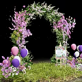 Floral Event Entrance Arch With Pink Purple Flowers Balloons Easel Sign And Green Grass