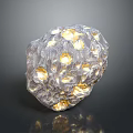 Unique Transparent Wooden Stone With Golden Specks And Irregular Holes On Dark Background