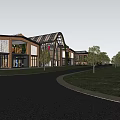 Modern Industrial Factory With Steel Structure Curved Roof Surrounding Greenery And Asphalt Road