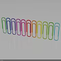 Colorful Paper Clips Arranged In A Row With Shiny Reflections On Sleek Surface