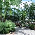 Modern Glass Canopy Structure at Building Entrance with Green Plants and Lawn