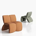 Modern Single Sofa In Orange And Green With Geometric Design For Living Space