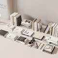 Books and Magazines Stacked in Various Sizes with Modern Arrangement and Decorative Items