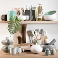 Assorted Kitchenware Collection With Mugs Bowls Spatulas And Teapot On Shelf