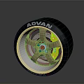 Car Wheel With ADVAN Brand Golden Rim And Green Brake Caliper Design