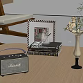 Vintage Marshall Speaker With Flowers In Vase On Books Over Wooden Table