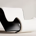 Modern Leisure Chair With Black And White Leather And Unique Curved Sleek Design